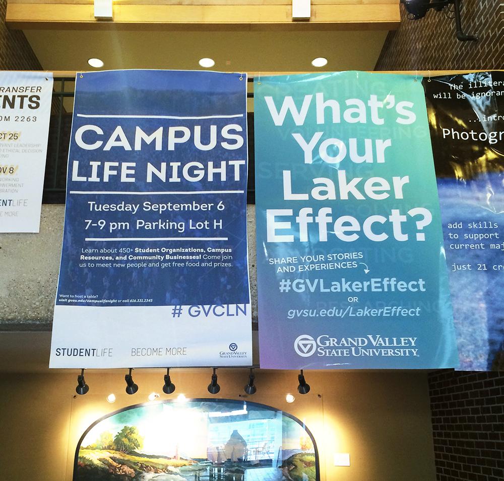 Campus Life Night and Laker Effect banners hanging in Kirkhof